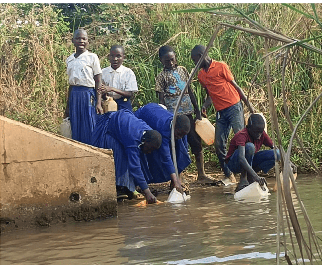Collecting water in Kigoma