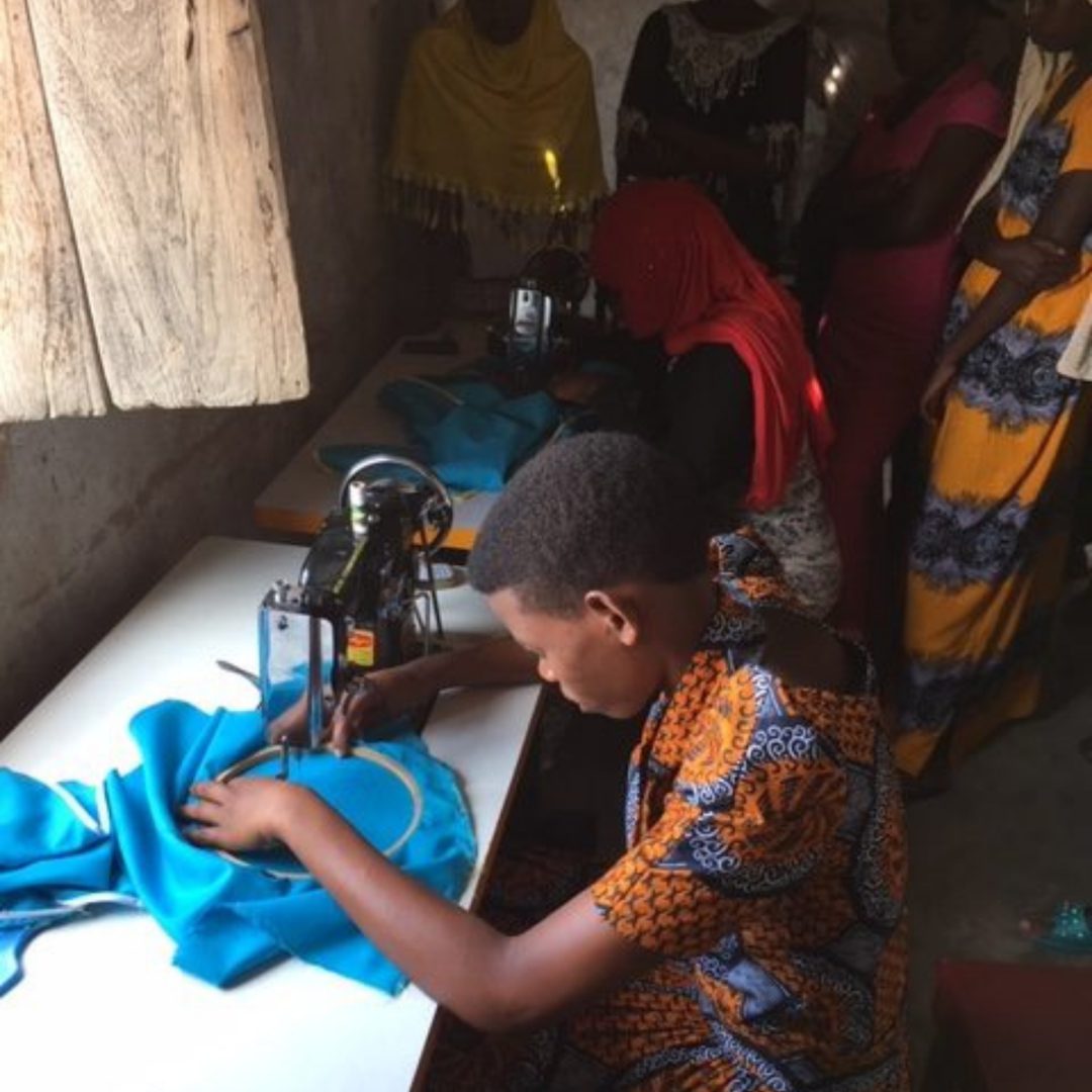 Young Tailor At Work