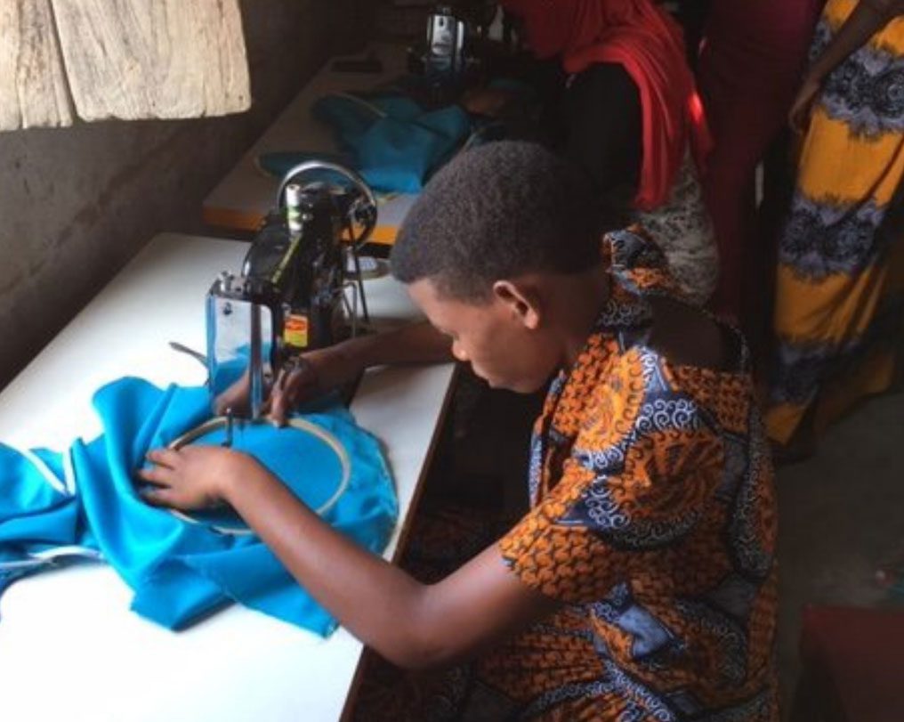 Young Tailor At Work